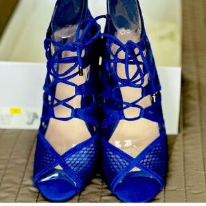 Sexy cobalt blue caged heels with mesh detail! This color is hot and sassy.